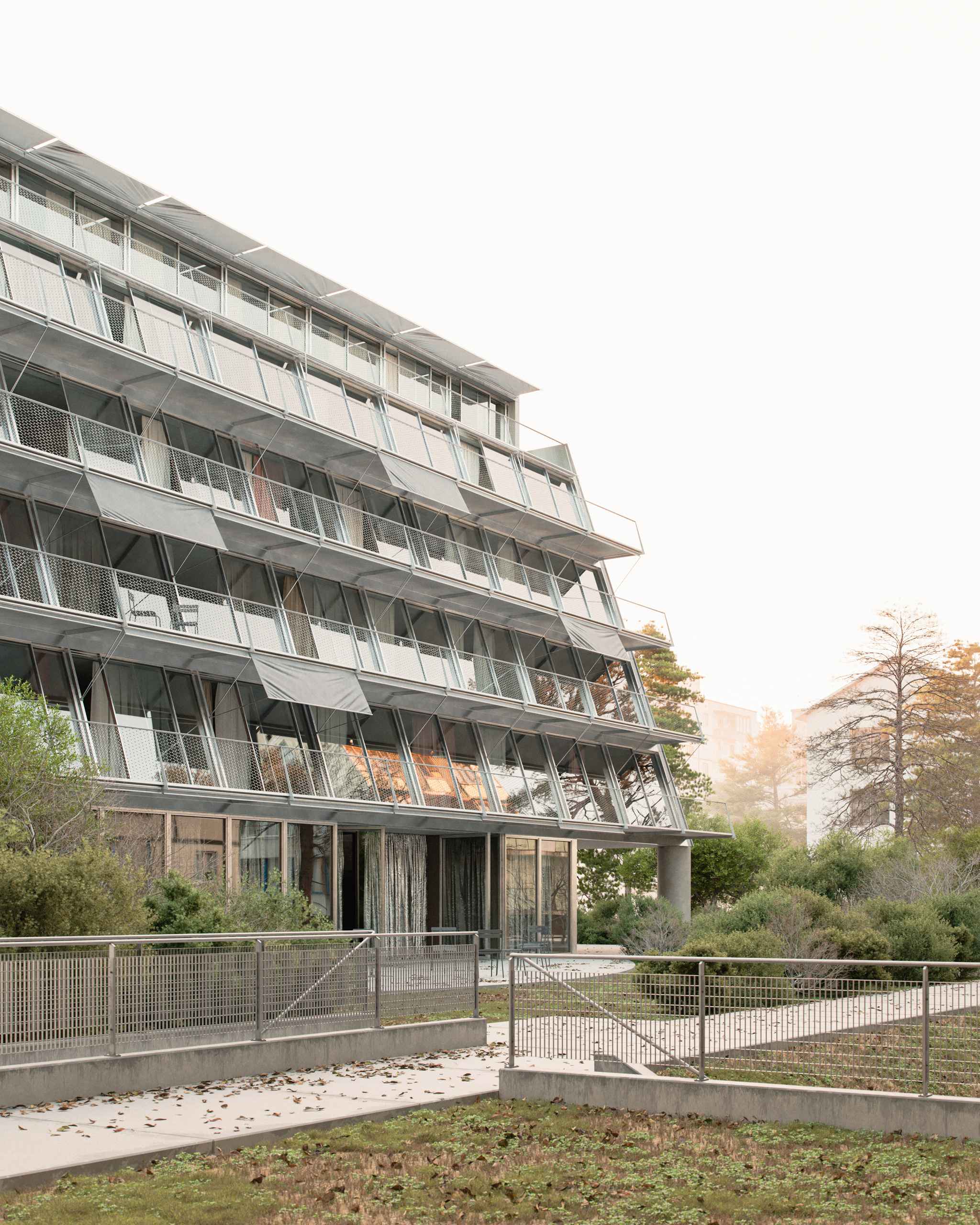 Aerial photorealistic exterior 3D Rendering of a modern multifunctional complex in an urban context in Washington. Still CG image produced by Scuares, an architectural visualization studio