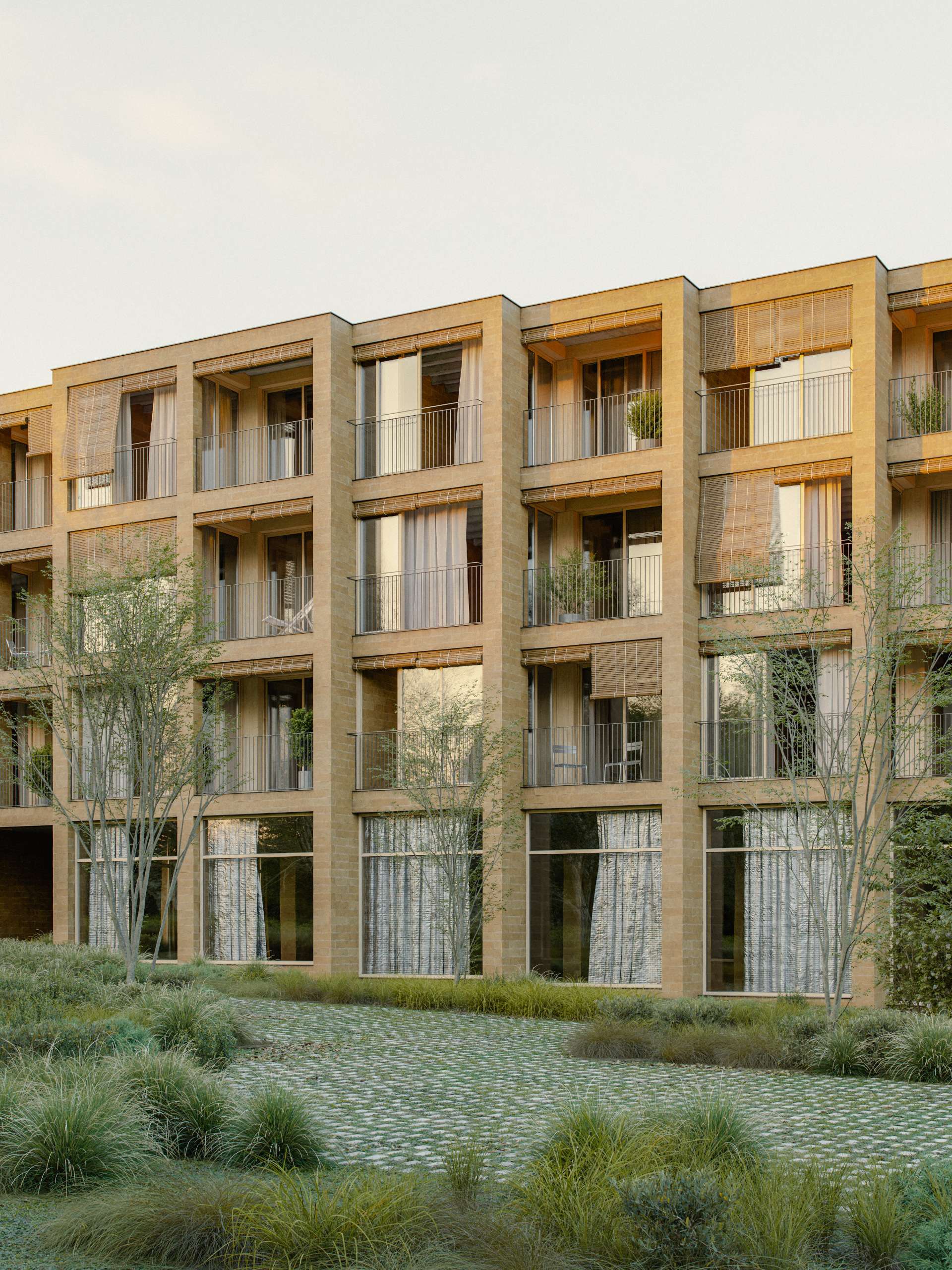 3D rendering of a brick housing façade with timber-framed balconies and a cobbled forecourt
