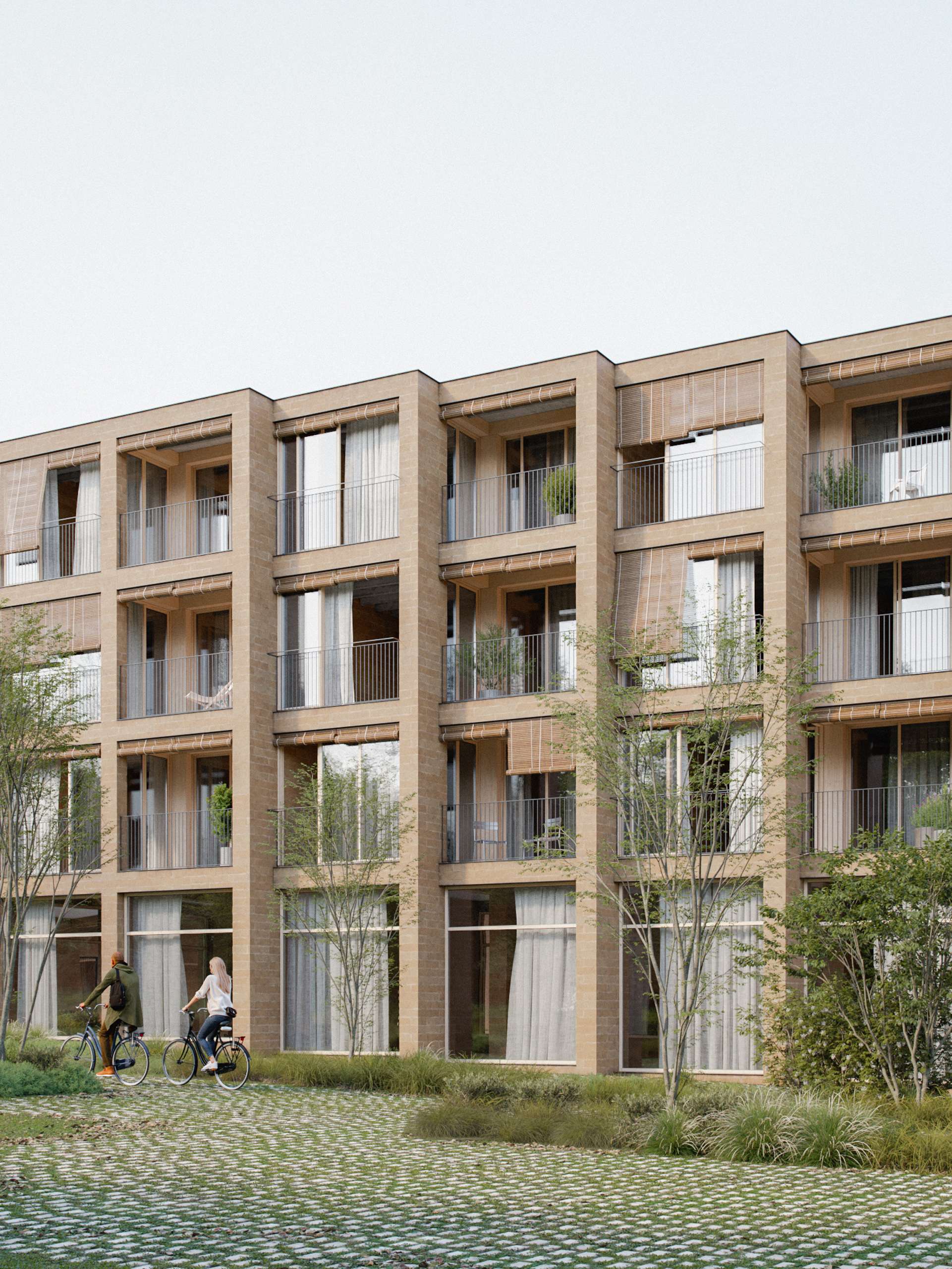 3D rendering of a brick housing façade with timber-framed balconies and a cobbled forecourt