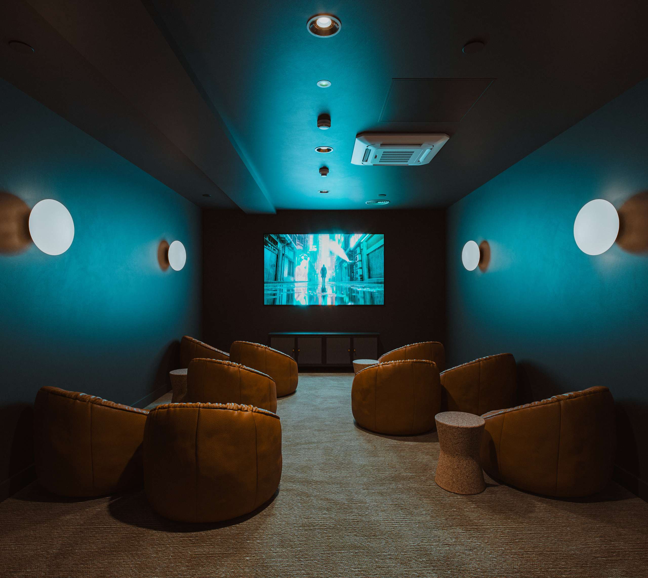 3D rendering of a small cinema with teal walls and upholstered lounge chairs