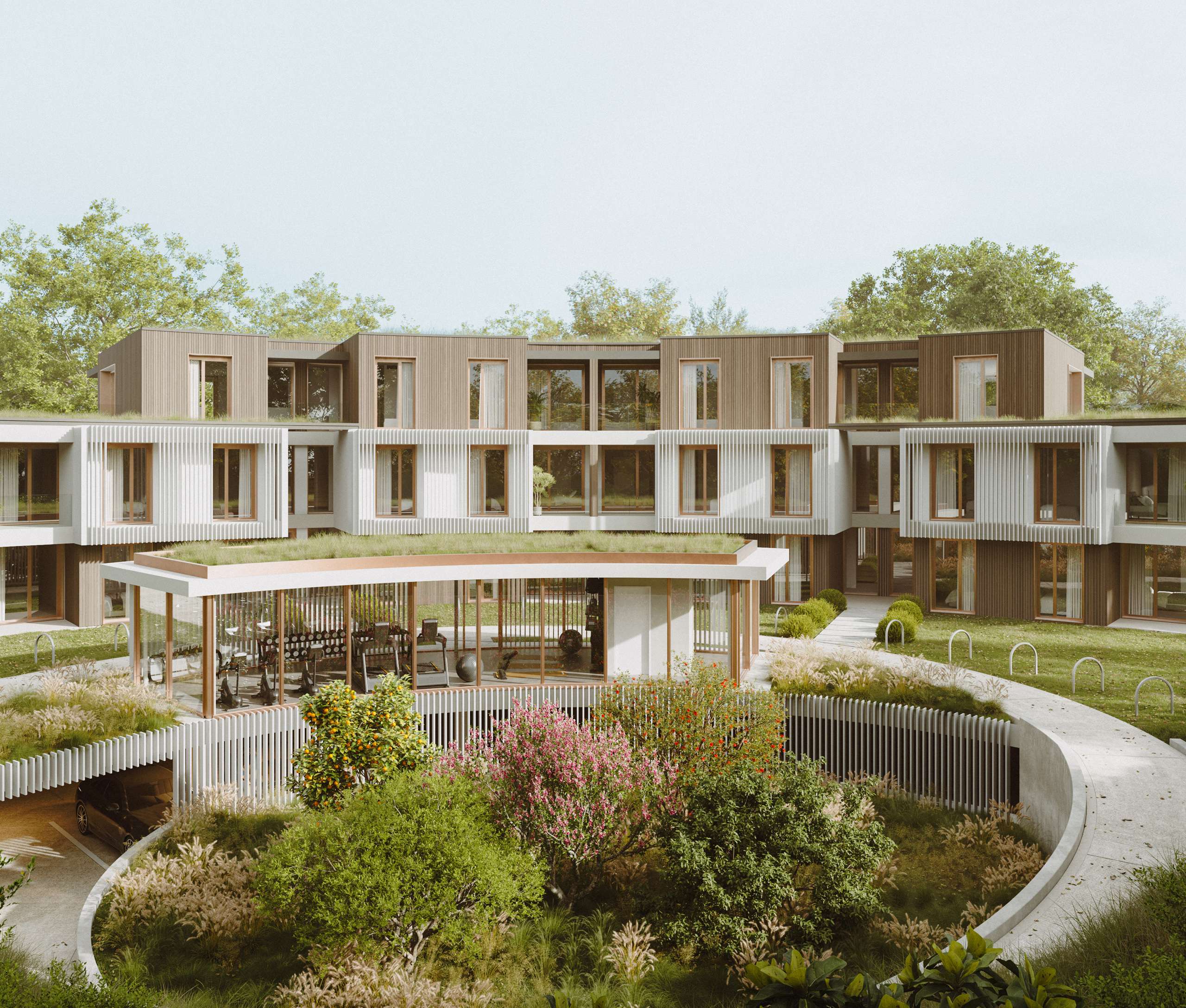 3D rendering of apartments surrounding a landscaped courtyard and covered seating area