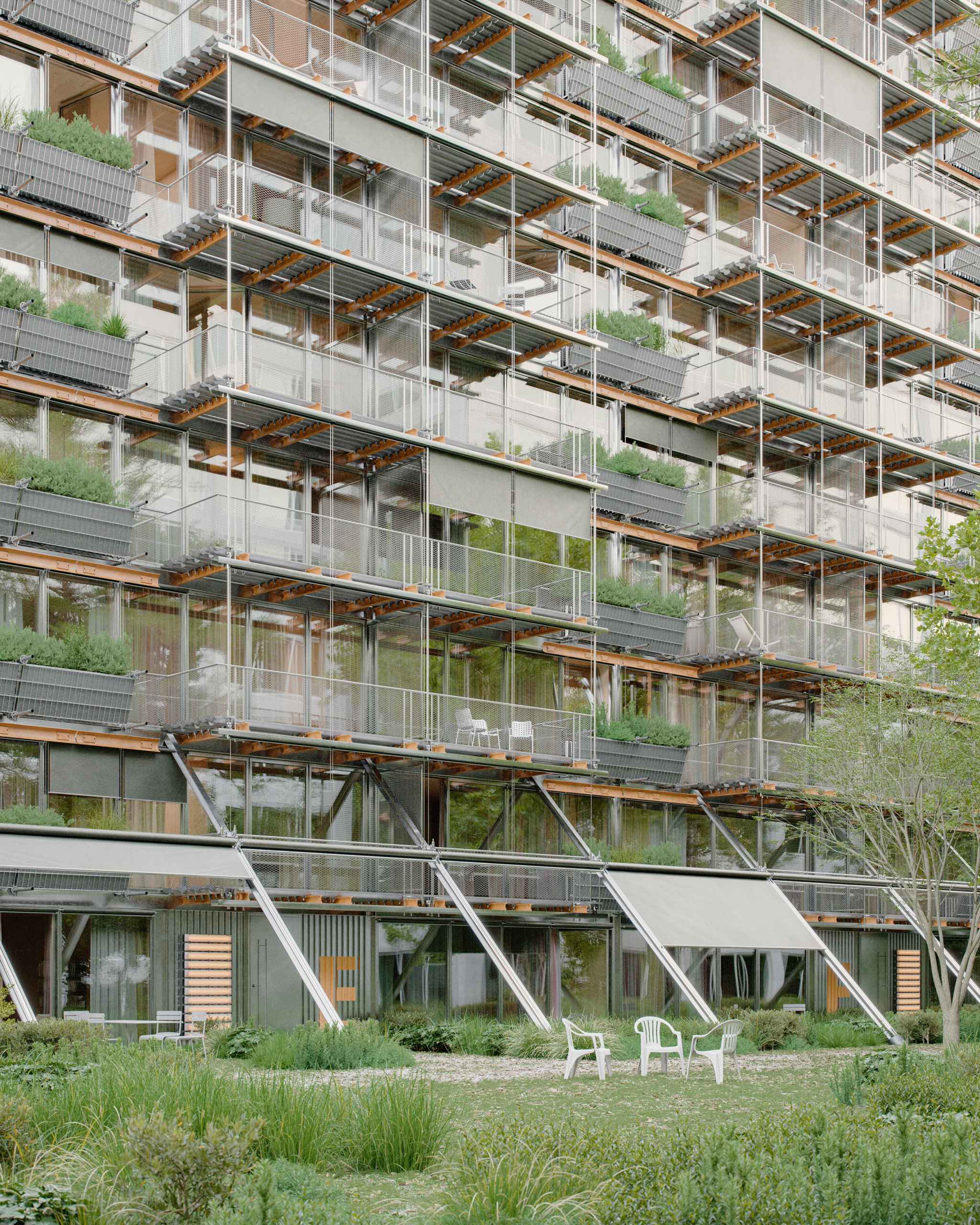 Aerial photorealistic exterior 3D Rendering of a modern multifunctional complex in an urban context in Washington. Still CG image produced by Scuares, an architectural visualization studio