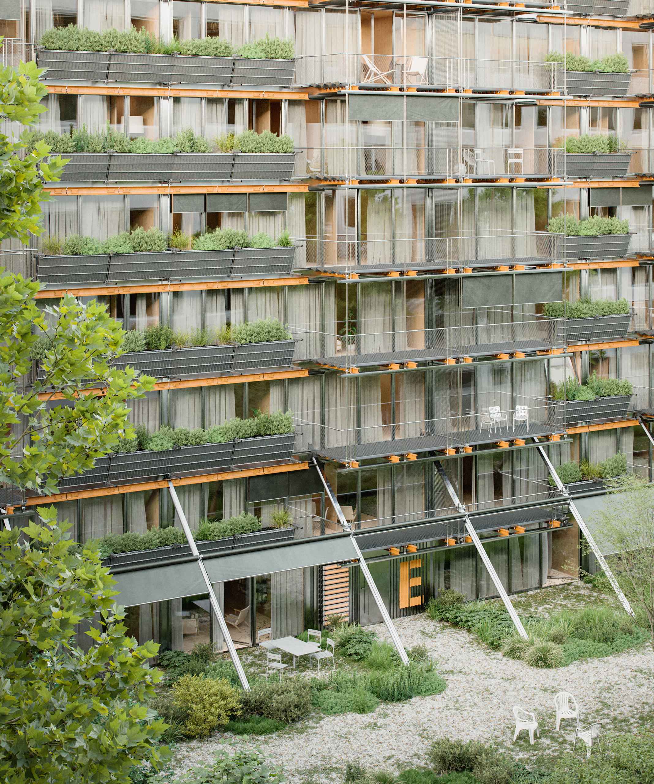 Aerial photorealistic exterior 3D Rendering of a modern multifunctional complex in an urban context in Washington. Still CG image produced by Scuares, an architectural visualization studio